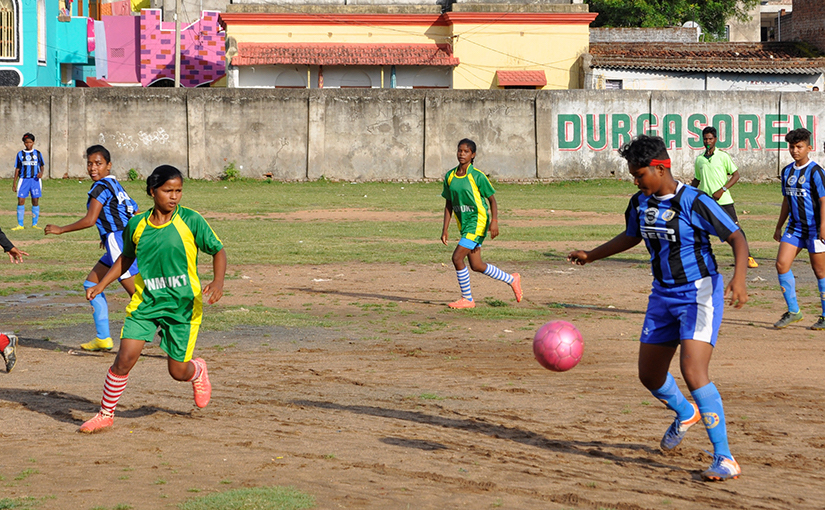 Raniya (left, in green), playing defense in her favorite game: soccer. Raniya joined the team as part of her participation in ChildFund’s Mind Without Fear project, which promotes gender equality in rural Jharkhand, India. Her friends in the program helped her stand up to her parents when they tried to arrange her marriage at age 15.